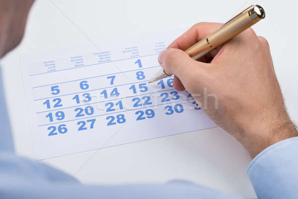 Businessperson Marking On Calendar Stock photo © AndreyPopov