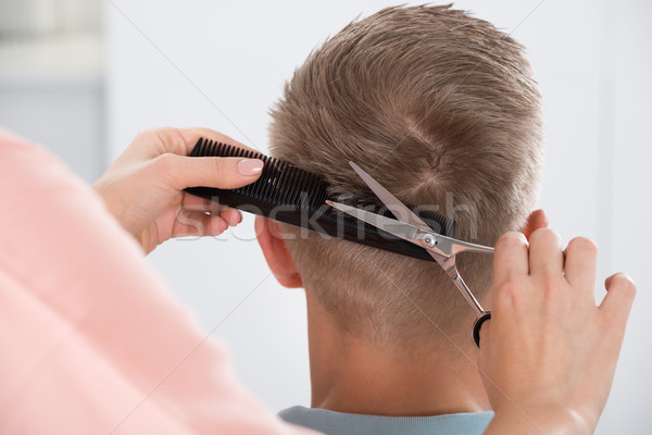 Mann Haarschnitt weiblichen Friseur Salon Rückansicht Stock foto © AndreyPopov