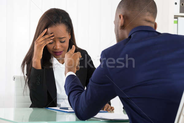 Jefe intimidación femenino trabajador senalando jóvenes Foto stock © AndreyPopov