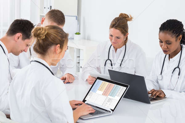 Group Of Doctors Using Laptop Stock photo © AndreyPopov