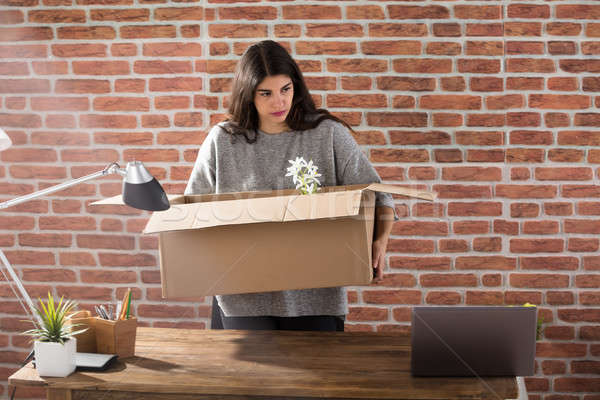 Fired Business Woman Packing Her Belongings Stock photo © AndreyPopov