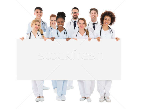 Grupo médico equipe quadro de avisos feliz Foto stock © AndreyPopov