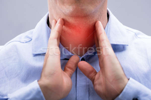 Close-up View Of A Man With Pain On His Neck Stock photo © AndreyPopov