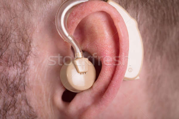 Férfi visel hallókészülék közelkép gyógyszer segítség Stock fotó © AndreyPopov