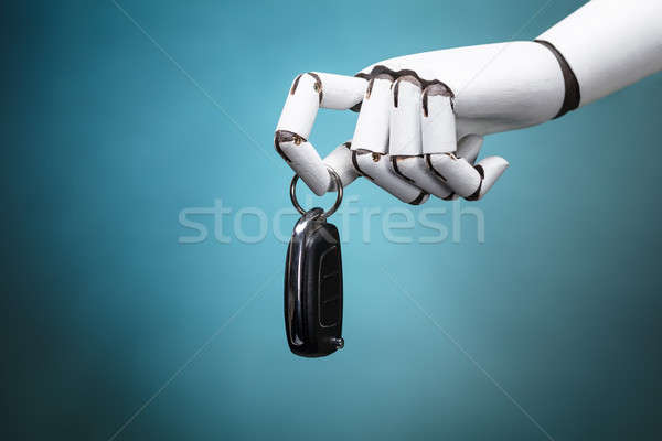 Robot Holding Car Key Stock photo © AndreyPopov