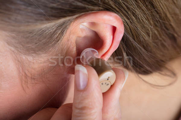 Nő visel hallókészülék közelkép fotó orvosi Stock fotó © AndreyPopov