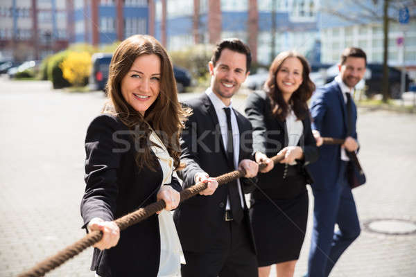 Businesspeople Playing Tug Of War Stock photo © AndreyPopov