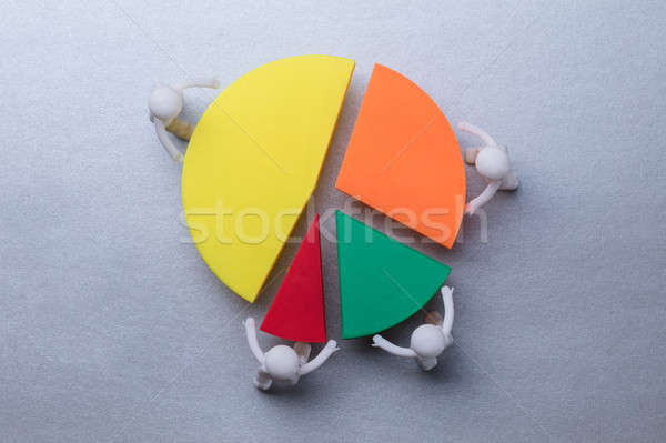 Human Figures Connecting Pieces Of Pie Chart Stock photo © AndreyPopov