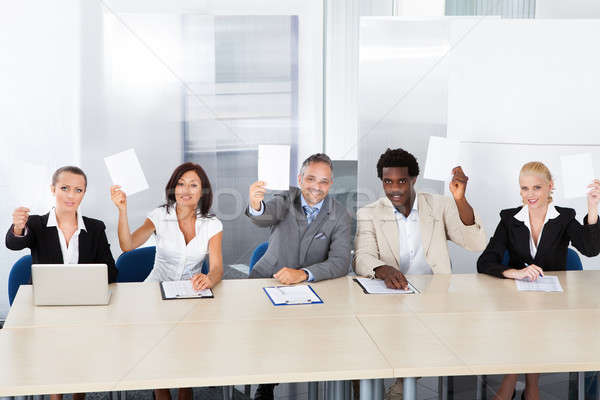 Corporate Personnel Officers Holding Paper Stock photo © AndreyPopov