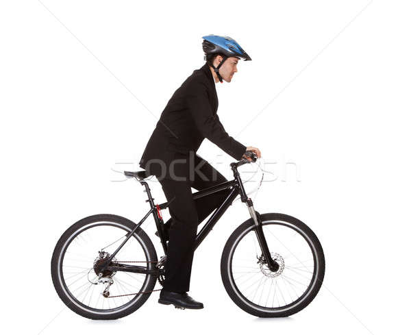 üzletember lovaglás bicikli munka öltöny testmozgás Stock fotó © AndreyPopov