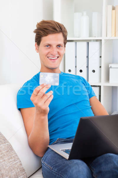 Young Man Shopping Online Stock photo © AndreyPopov