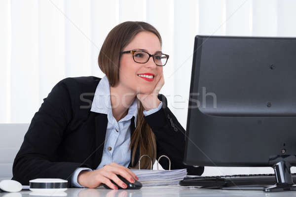 Businesswoman Using Computer Stock photo © AndreyPopov