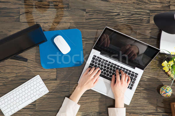 Businesswoman Using Laptop Stock photo © AndreyPopov