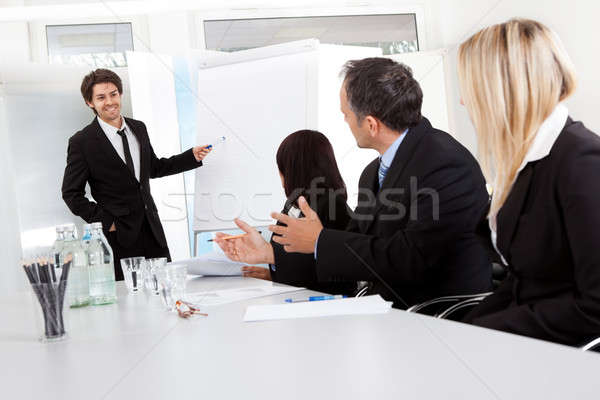 Group of business people at presentation Stock photo © AndreyPopov