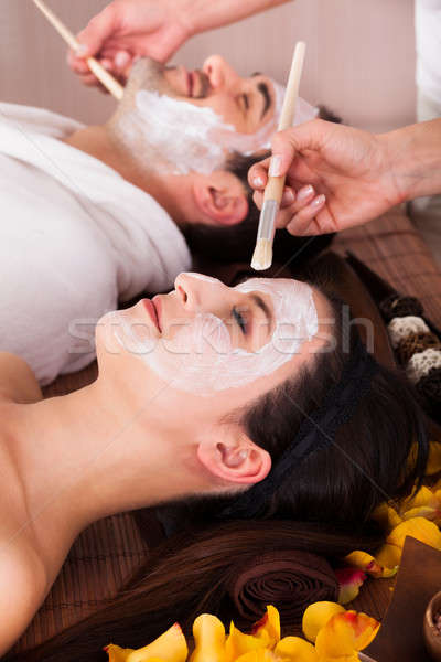 Stock photo: Couple With Face Mask In Spa Centre