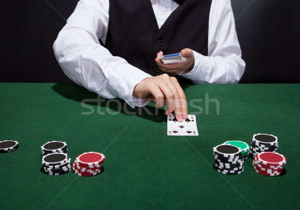 Stock photo: Croupier dealing cards