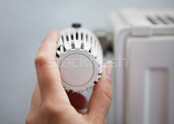 Nő termosztát kéz hőmérséklet otthon fém Stock fotó © AndreyPopov