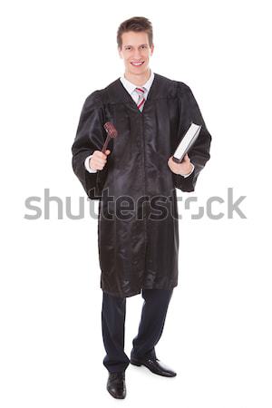 Judge Holding Gavel And Book Stock photo © AndreyPopov