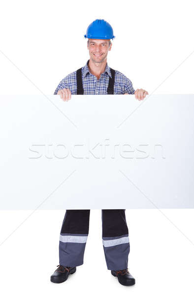 Male Worker With Blank Placard Stock photo © AndreyPopov