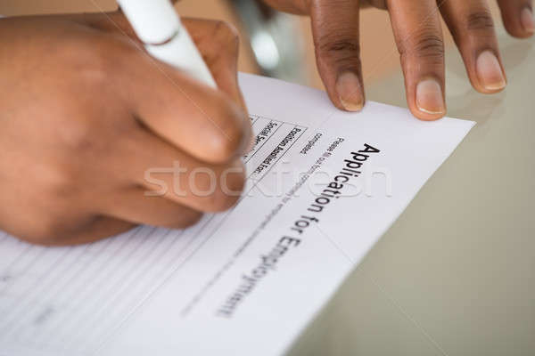 Woman Filling Employment Form Stock photo © AndreyPopov