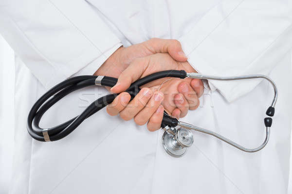 Doctor de sexo masculino mano estetoscopio primer plano médico Foto stock © AndreyPopov