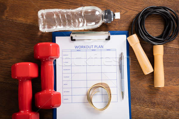 Workout Plan Form With Fitness Equipments Stock photo © AndreyPopov