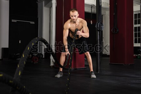 Mann Ausbildung Seile Fitnessstudio jungen Athleten Stock foto © AndreyPopov