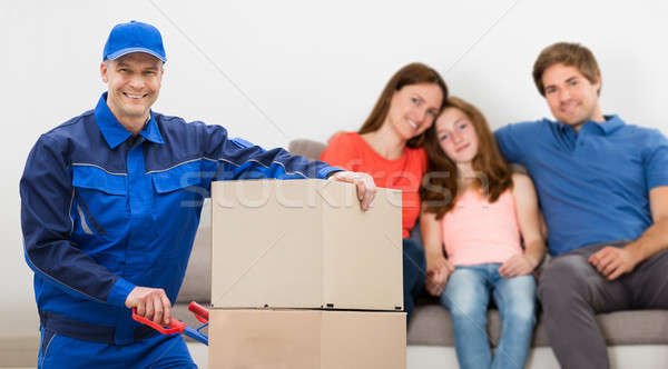 Portrait Of A Delivery Man With Cardboard Boxes Stock photo © AndreyPopov