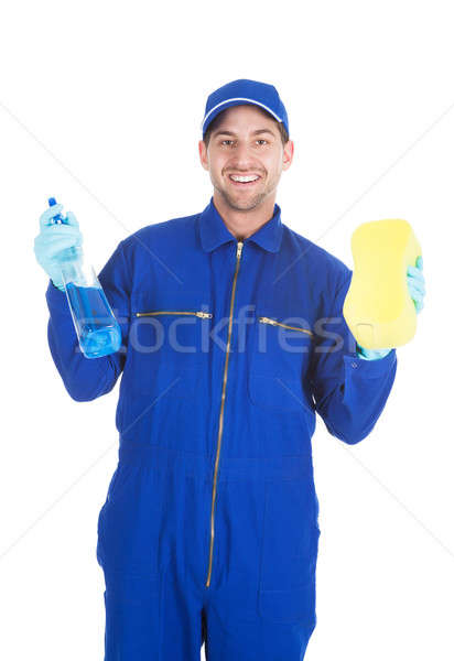 Diener halten Reinigung Spray Schwamm Porträt Stock foto © AndreyPopov