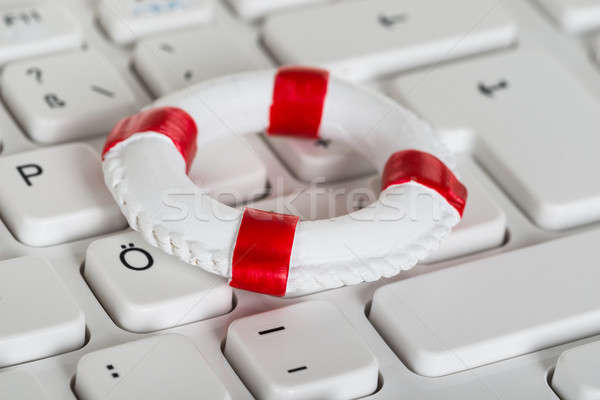 Lifebelt On Keyboard Stock photo © AndreyPopov