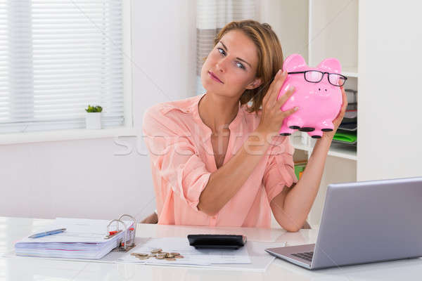 Femme tirelire facture bureau jeunes belle femme [[stock_photo]] © AndreyPopov