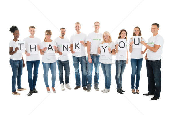Confident Volunteers Showing Thank You Sign Stock photo © AndreyPopov