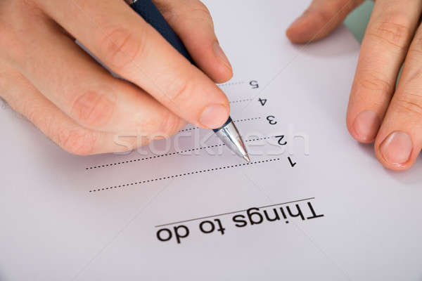Person's Hand Writing Things To Do List Stock photo © AndreyPopov