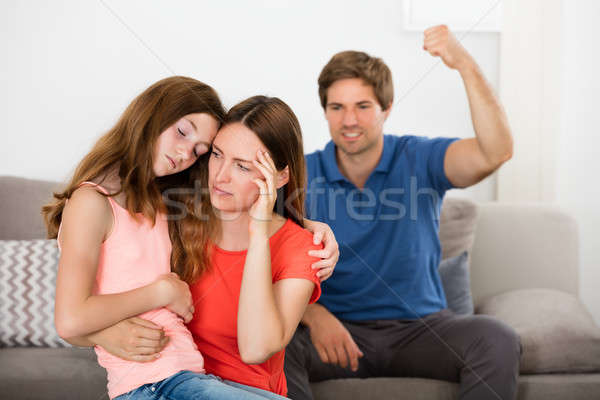 Mother And Daughter Depressed With Violent Father Stock photo © AndreyPopov
