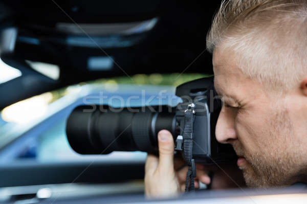 Man Photographing With SLR Camera Stock photo © AndreyPopov