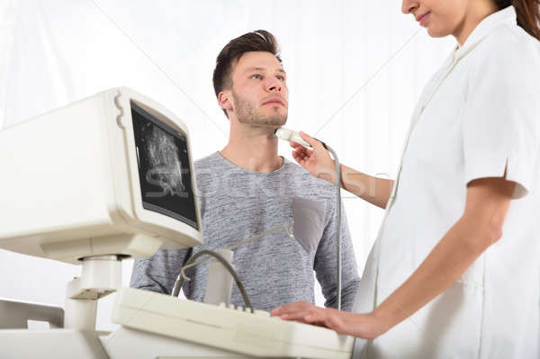 Férfi beteg ultrahang mirigy fiatalember scan Stock fotó © AndreyPopov