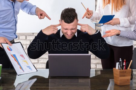 Angry Business People Pointing At Colleague Stock photo © AndreyPopov