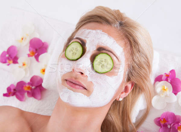 Cosmetician Applying Facial Mask On Face Of Woman Stock photo © AndreyPopov