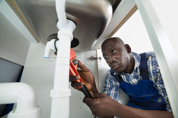 Handyman Repairing Sink Pipe Stock photo © AndreyPopov