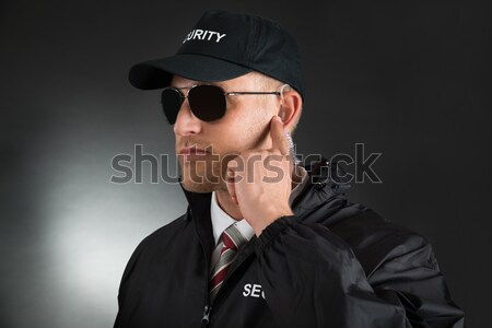 Masculina guardaespaldas arma retrato jóvenes Foto stock © AndreyPopov