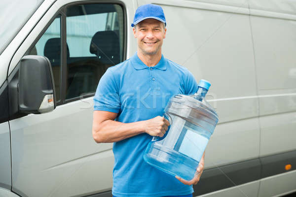 Halten Wasserflasche glücklich LKW Mann Stock foto © AndreyPopov