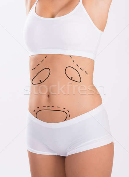 Midsection Of Woman With Markings On Stomach Stock photo © AndreyPopov