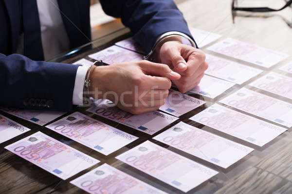 Businessperson In Handcuffs Arrested For Bribe Stock photo © AndreyPopov
