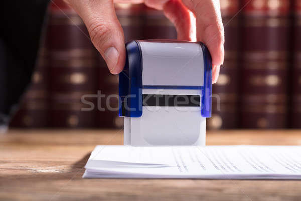 Judge Stamping Document Stock photo © AndreyPopov