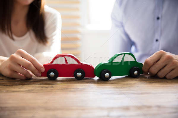 Couple Showing Red And Green Colored Car Crash Stock photo © AndreyPopov