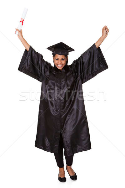 Stock photo: Excited Graduate Woman Holding Certificate