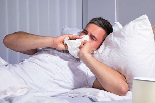 Mann Nase weht infiziert kalten Grippe Gewebe Stock foto © AndreyPopov