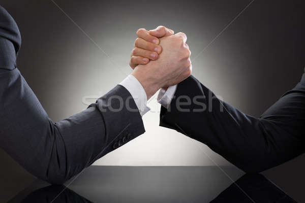Dwa biznesmen armwrestling strony Zdjęcia stock © AndreyPopov