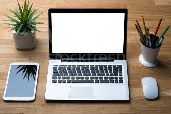 Technologies With Office Supply On Wooden Desk Stock photo © AndreyPopov