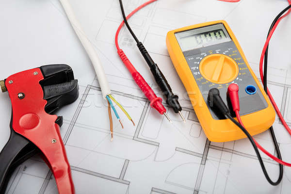 Digital Multimeter On Blueprint Stock photo © AndreyPopov